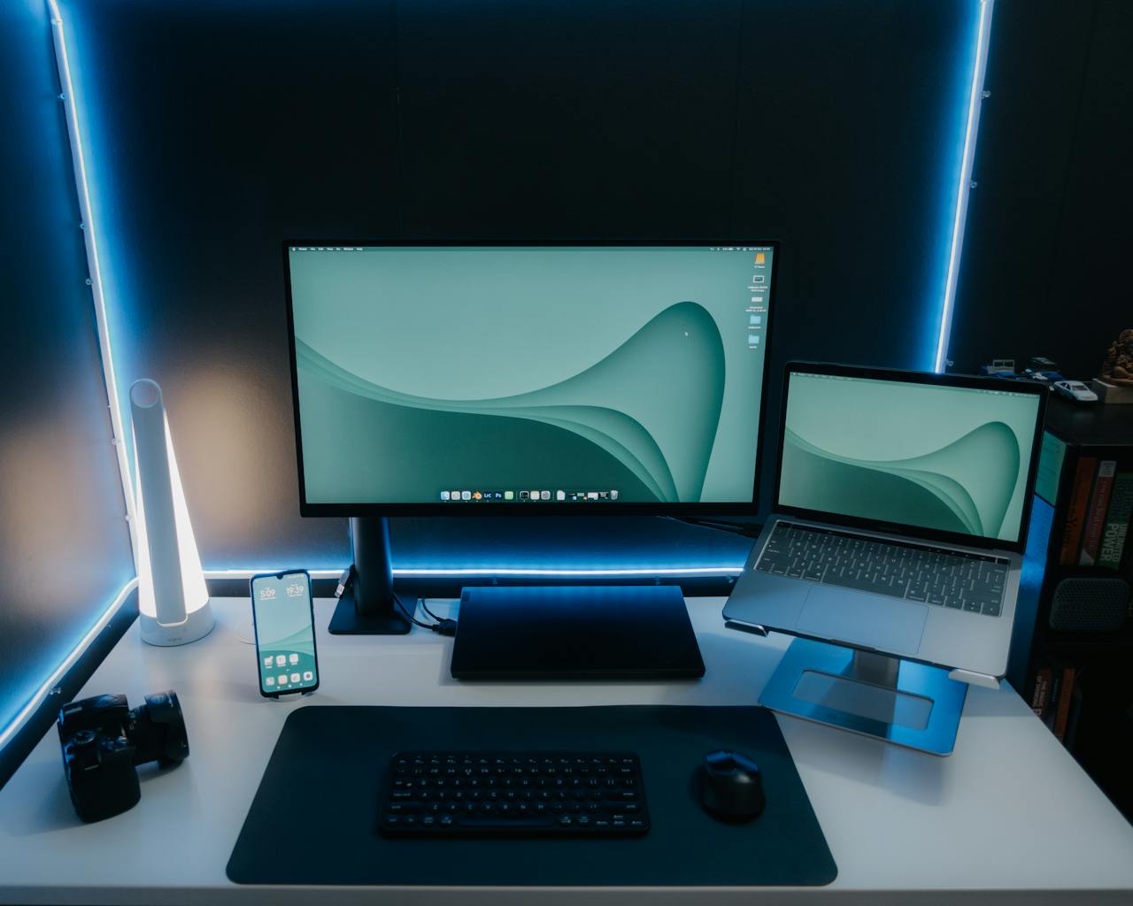 Black Flat Screen Computer Monitor on Black Wooden Desk